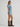 Light wash ranch romper by Wrangler at 6Whiskey, six whisky, Women’s denim snap utility romper, wide collar, snap closure, adjustable belt, front pockets, side pockets, cuffed short sleeves and shorts, durable, year-round, modern western, flattering, casual western, SEC gameday, tailgate, sports season, breathable, summer, spring, side view