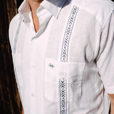 Perla Linen Tejas Guayabera Shirt by Texas Standard at 6Whiskey six whisky white short sleeve button down collared double front pocket barbed wire embroidery navy stitching side buttons linen cotton blend men's Western shirt mens clothing