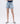 Front view of The Bluebonnet High Rise Cuffed Denim Shorts in light wash, styled for summer outfits at 6whiskey six whisky womens