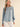 Heritage Smocked Denim Blouse at 6Whiskey, six whisky, long sleeve, balloon sleeve, cuff, placket, western yolk detail, breathable, lightweight, warm weather, frill detail, southern charm, SEC, church blouse, rodeo, brunch date, weekend outfit, modern western, casual, casual western, women's fashion, women's clothing, front view.