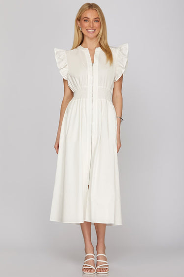 Homefield white dress at 6Whiskey, six whisky, midi dress, zip closure front, v-neck, sleeveless dress, ruffle sleeves, casual dress, cinched waist, game day, tailgating, texas a&m, SEC, front view, full view, midi length, white dress, casual chic dress, gameday outfit, aggie dress, aggies, a&m outfit, gameday attire, aggie style, Ivory ruffle detail, ideal for fall game day or tailgate looks outfit inspo. pockets.