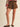 Outlaw Studded Skort at 6Whiskey, six whisky, gold stud detail, front pockets, elastic waistband, panel, soft, comfortable, edgy, western, versatile, closet staple, stand out piece, statement piece, all-year round, round top, rodeo, texas, girls night out, neutral, dark brown, espresso, suede, front view.