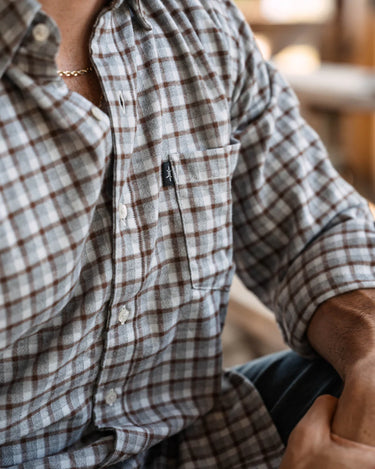 Callahan Flannel by Texas Standard at 6Whiskey, six whisky, grid pattern, brown, blues, whites, front pocket, collar, button down, layering piece, lightweight, soft, comfortable, long sleeve, rodeo, country concert, everyday wear, standalone, front view.