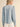 Heritage Smocked Denim Blouse at 6Whiskey, six whisky, long sleeve, balloon sleeve, cuff, placket, western yolk detail, breathable, lightweight, warm weather, frill detail, southern charm, SEC, church blouse, rodeo, brunch date, weekend outfit, modern western, casual, casual western, women's fashion, women's clothing, back view