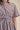 Easy Ride Stripe Dress at 6Whiskey, six whisky, short sleeve, vertical stripe, horizontal stripe sleeve, v-neck, short, flattering, feminine, chic, classy, lunch date, errands, casual outing, cinched waist, adjustable bow detail, button detail, southern charm, detail view
