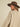 Rodeo Knit Pullover at 6Whiskey, six whiskey, round neckline, crewneck, ribbed hemline, oversized, neutral beige, dark brown, boot graphic, country, western, casual, rodeo, country, country concert, lunch date, market, errands, layer, fall, winter, cooler weather, back view.