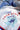 Lone Star State Silk Scarf, bandana, square, soft, smooth, texas icon graphics, texas pride, lone star, blue bonnet, cowboy boot, texas outline, texas flag, cactus, horseshoe, asymmetrical, stars, scallop boarder, red, white, blue, yellow, brown, green. Front view.