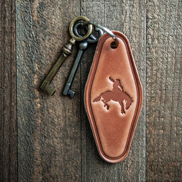 Bucking Bronco Keychain at 6Whiskey, six whisky, leather keychain, brown leather, high quality, durable, rugged, refined, everyday accessory, western, cowboy, horse, gift idea, unisex, front view