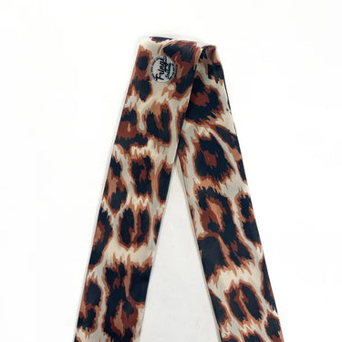 Leopard Twilly by Fringe Scarves at 6Whiskey, six whisky, leopard print, animal print, fun, flirty, western, bold, edgy, cool, stylish, chic, western accessory, womens accessory, eye catching, modern western. Front view.