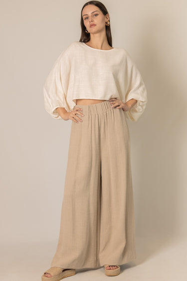 Cropped Linen Top by 6whiskey, six whisky, long sleeve, puff sleeve, round neck, cropped, breathable, effortless, sophisticated, polished, stylish, chic, work wear, casual, fall, women's fashion. Front view.