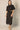 Black Linen Cropped Top by Pcill at 6Whiskey, six whisky, button down, collar, draw string detail, lightweight, breathable, western, country, casual, everyday, pockets, short sleeve, cool girl, sleek. Front view.