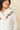 Winne Western Shirt at 6Whiskey six whisky womens button down by tasha polizzi white with turquoise snap buttons and red, yellow, and orange emboridered flowers