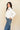 Winne Western Shirt at 6Whiskey six whisky womens button down by tasha polizzi white with turquoise snap buttons and red, yellow, and orange emboridered flowers