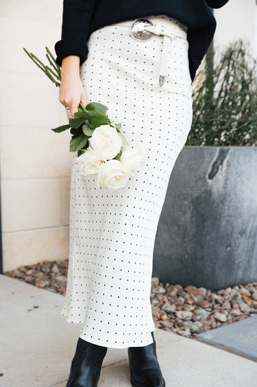 The Love Note Dot Skirt, midi length, long, maxi, elastic waistband, flowy, slimming, flattering, feminine, classy, elegant, chic, it girl, trendy, office skirt, lunch date, casual elevated, it girl, cool girl, lightweight, comfortable, stretchable, must-have basic, year-round skirt, front view