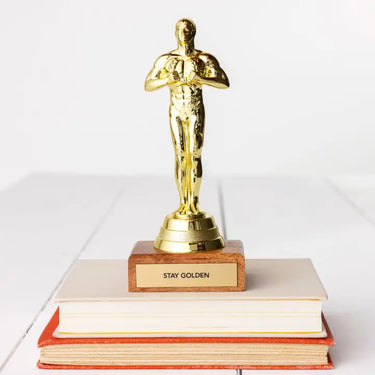 Stay Golden Trophy at 6Whiskey six whisky jenni earle home goods home decor coffee table bookshelf decoration gold finish metal wood oscar award inspired man