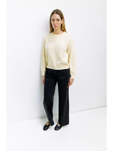 Sunbeam Stripe Sweater at 6Whiskey, six whisky, kinsley sweater, pale yellow, cream, stripped, long sleeve, crewneck, cuffed hem, ribbed hem, casual dress, SEC sorority girl, layer, church outfit, market, brunch date, casual weekend, summer, spring, top, pullover, sweater, front view.