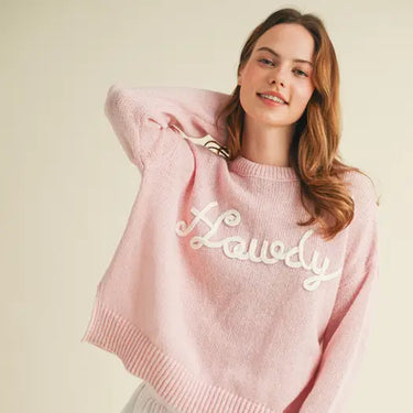 Howdy Pink Sweater at 6Whiskey, six whisky, felt howdy cursive lettering, ribbed neckline, cuffed sleeves, long sleeved, cold weather, warm sweater, cozy, soft knit, relaxed fit, classy, casual western top, winter sweater, layering top, front view
