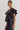 Black Leather Ruffle Top at 6Whiskey six whisky ruffle short sleeve black faux leather boxy keyhole back large sleeve