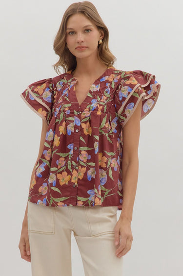 Maroon Meadow Top at 6Whiskey, six whisky, short sleeves, ruffle sleeves, beige contrast piping, button closure, pleated, split neck, feminine, botanical design, floral, flowers, greenery, orange, green, purple, flattering, casual, everyday, tamu, texas a&m, gameday, tailgate, lunch date, front view