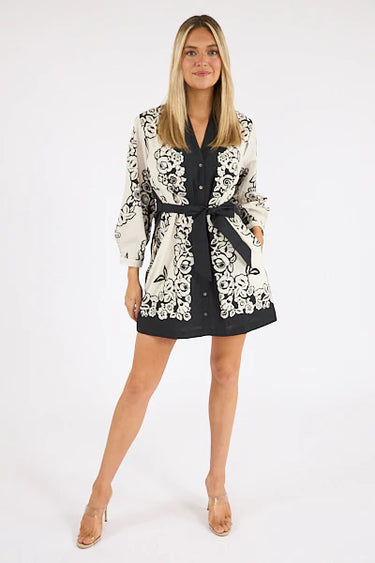 Lilian Mini Dress by Cleobella at 6Whiskey, six whisky, long sleeve, puff sleeve, button front, v-neck, split front, button closure, tie waist, side pockets, floral design, classy, elevated, versatile, botanical. Front view
