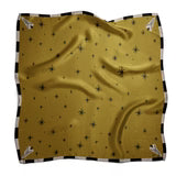 Gold Skull Scarf at 6Whiskey, six whisky, star design, skull design, black and white checkered boarder, cool girl, it girl, modern western, moody, western inspired, unique, bold, refined, rugged. Front view.