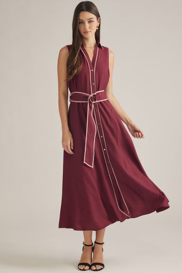 Aggie darling dress at 6Whiskey, six whisky, midi dress, adjustable belt, v-neck, sleeveless dress, casual dress, western, contrast piping detail, collar, game day, tailgating, texas a&m, SEC, front view, full view, full length, maroon dress, burgundy dress, gameday outfit, button up front dress, casual chic aggie dress, aggies, a&m outfit, belted waist dress.