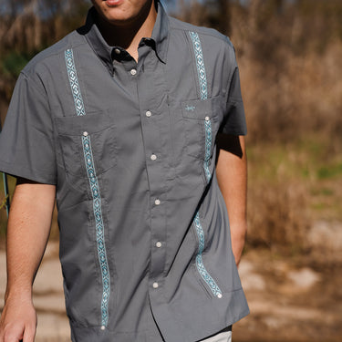 Grey Gray Trucha Guayabera Libre by Texas Standard at 6Whiskey, six whisky, unique blue embroidery, hidden zipper pocket on chest, breathable, lightweight, western, casual, versatile. Front view. Performance material. Summer Men's style. Texas outdoor style.