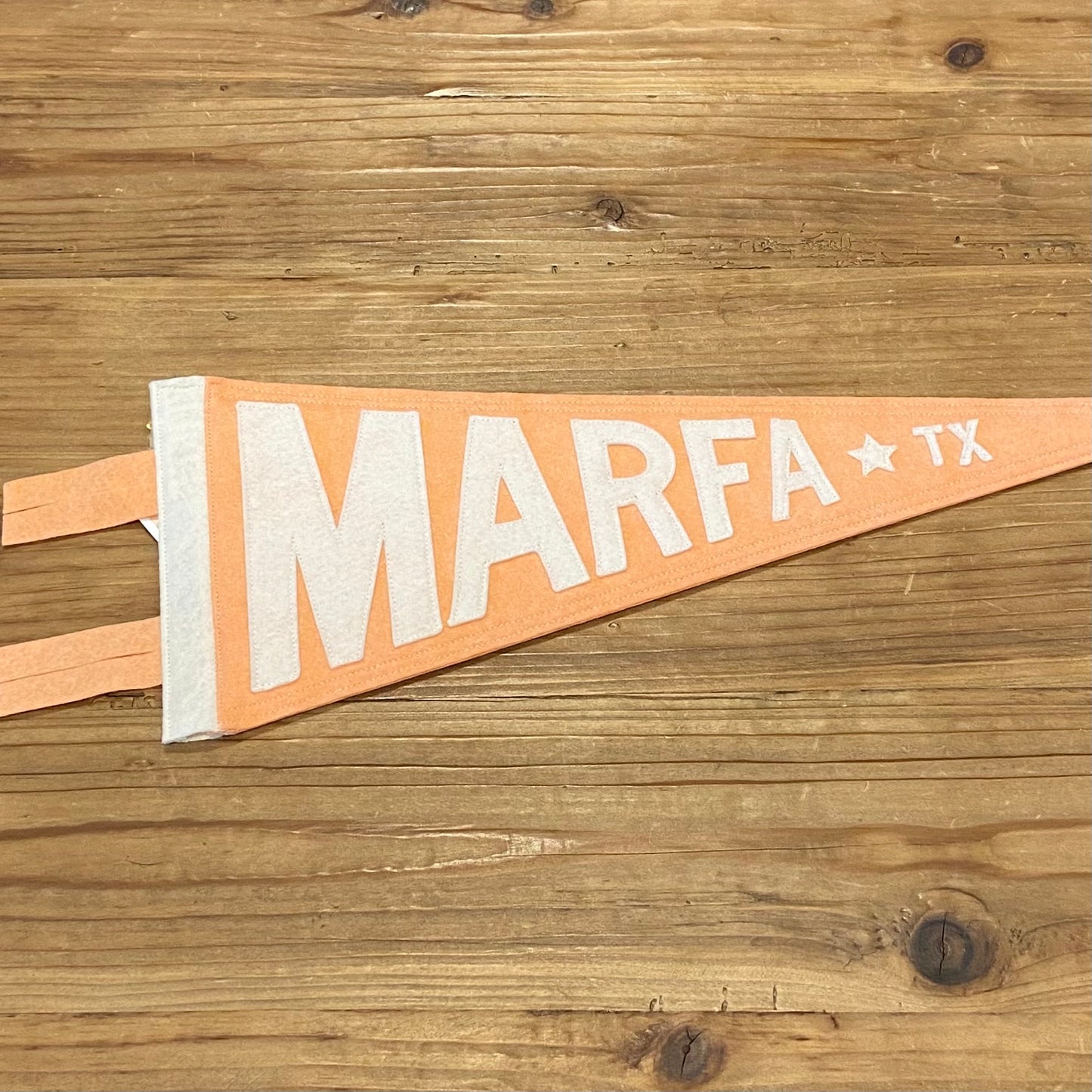 Marfa Texas Handmade Felt Pennants at 6Whiskey six whisky in color peach with white letters