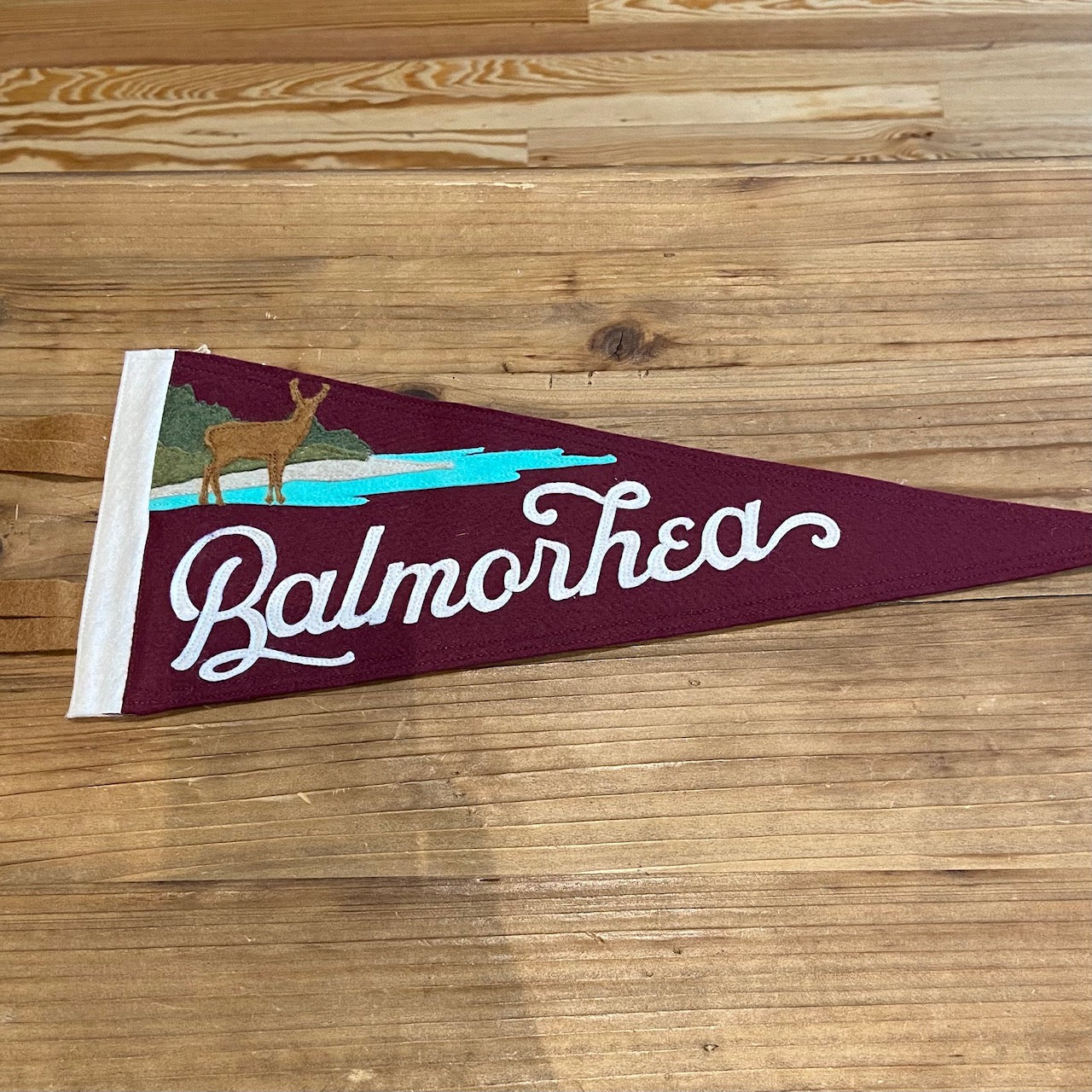 Balmorhea Texas State Park Handmade Felt Pennant at 6Whiskey six whisky in color maroon/wine featuring a deer and water