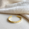 Sculpt Cuff Thin at 6Whiskey, six whisky, shiny, gold, bracelet, accessory, jewelry, jewellery, rodeo, SEC, gameday, chic, office, work fashion, everyday, stackable, layer jewelry, timeless, elevated, timeless, classy, modern, hammered, 18k gold plated, front view