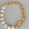 Pearl and Loop Bracelet at 6Whiskey, six whisky, toggle closure, sparkling white pearls, gold beads, half and half, elegant, elevated, rodeo, country concert, gameday, lunch date, formal event, everyday bracelet, stackable, standalone, classy, chic, trendy, front view