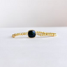 Black Stone Stretch Bracelet at 6Whiskey, six whisky, gold beaded bracelet, adjustable, shiny, elevated, everyday chic, modern, timeless, classy, southern charm, texas style, rodeo, country concert, SEC, gameday, everyday stack, layer able, accessory, comfortable fit, front view