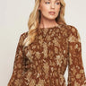 Golden Meadow Smocked Dress at 6Whiskey, six whisky, high neck, smocked from tan back, balloon sleeves, long sleeve, short dress, mini dress, layered, flowy, moves with you, casual western, transition piece, fall, spring, winter, church dress, rodeo, country concert, night out at stockyards, breathable, standalone, brown base, light brown beige, ivory, cream, white florals, vintage floral, botanical, front view