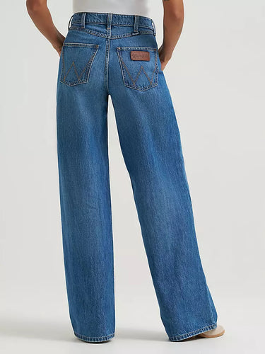 Bailey Wide Leg Jeans by Wrangler at 6Whiskey, six whisky, comfort, no stretch, rodeo, concert, errands, work, casual western, everyday, versatile, effortless, durable, stylish, women's fashion, women's clothing, blue jeans, denim, medium wash, flattering, W stitching, 5-pocket design, wrangler roping logo, belt loops, back view