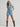 Light wash ranch romper by Wrangler at 6Whiskey, six whisky, Women’s denim snap utility romper, wide collar, snap closure, adjustable belt, front pockets, side pockets, cuffed short sleeves and shorts, durable, year-round, modern western, flattering, casual western, SEC gameday, tailgate, sports season, breathable, summer, spring, front view