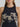 Shadow Stallion Tank by Wrangler at 6Whiskey, six whisky, Cowboy Tank in Lainey Wilson X Wrangler collection, sleeveless, tank top, black, beige ucking bronco rider graphic across front, ribbed cuff, high round neckline, soft, comfortable, breathable, lightweight, summer, spring, layer piece, must-have, retro western, cool girl, it girl, ribbed cuff and graphic detail view
