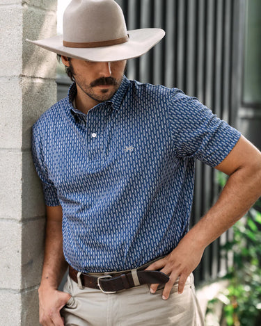 Traditions Polo by Texas Standard at 6Whiskey, six whisky, men's top, mens dress shirt, men's polo, patterned, geometric, short sleeve top, collared shirt, versatile mens top, mens gift, navy blue, deep blue, western, casual. Front view.