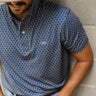 Traditions Polo by Texas Standard at 6Whiskey, six whisky, men's top, mens dress shirt, men's polo, patterned, geometric, short sleeve top, collared shirt, versatile mens top, mens gift, navy blue, deep blue, western, casual. Front view.