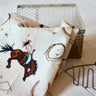 Yeehaw Cowgirl Tea Towel at 6Whiskey six whisky tirzah lane art hand drawn hande made stars roping cowgirl bucking horse horseshoe mountain pattern printed white home goods home decor kitchen towel
