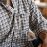 Callahan Flannel by Texas Standard at 6Whiskey, six whisky, grid pattern, brown, blues, whites, front pocket, collar, button down, layering piece, lightweight, soft, comfortable, long sleeve, rodeo, country concert, everyday wear, standalone, front view.