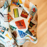 Matchbook Bandana at 6Whiskey sxi whisky– Vintage-inspired western bandana featuring colorful illustrations by XOXO Art Co. of matchbooks from classic Texas motels, honky-tonks, and diners. A nostalgic cowboy accessory for modern western wear