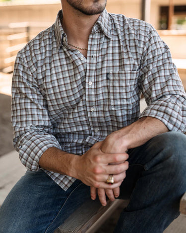 Callahan Flannel by Texas Standard at 6Whiskey, six whisky, grid pattern, brown, blues, whites, front pocket, collar, button down, layering piece, lightweight, soft, comfortable, long sleeve, rodeo, country concert, everyday wear, standalone, front view.