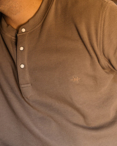 Pecan Henley by Texas Standard at 6Whiskey, six whisky, long sleeve, waffle knit, light brown, pearl snap, layer, fall, winter, standalone, layer piece, elevated basic, casual western, comfortable, lightweight, breathable, rodeo, lunch outfit, gift idea for men, detail view. 