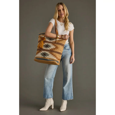 Canyon Stripe Tote at 6Whiskey, six whisky, leather straps, tassel, blue, cream, burnt orange, light brown, beige, black, southwestern, texas, native, western inspired, casual, bag, accessory, large bag, front view