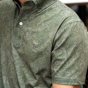 Agave Big bend topo Texas Traditions Polo at 6Whiskey six whisky collared UPF 40 Texas Standard short sleeve cool wrinkle-resistant lifestyle front view on up close detail barbwire Texas Standard logo