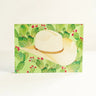 Cactus Acrylic Block by Catherine Cartie at 6Whiskey, six whisky, light green background, green cactus with flowers, cream cowboy hat, classic western, timeless, rugged, refined, pop of color, lone star, texas, desk, shelf, coffee table, front view