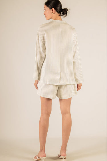 Pinstripe Oversized Blazer by P cill at 6whiskey, six whisky, relaxed fit, oversized, collared, wide sleeve, vertical stripe, stripped, cream, black, elevated, comfortable, chic, classic, game day, gameday, tailgate, football. Back view.