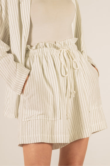 Pinstripe Shorts at 6whiskey, six whisky, relaxed fit, front tie, double lined, vertical stripes, stripped, high waisted, side pockets, mid length, mom fit, elevated, casual, chic, comfortable. Details view.