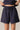 Navy Soft Shorts at 6whiskey, six whisky, high-waisted, draw string waistband, side pockets, mid length, comfortable, bottoms, cozy, soft, women's, women's fashion, set, wide leg, fall. Front view.