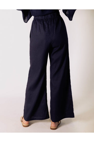 Indigo Market Linen Pant by Pcill at 6Whiskey, six whisky, wide leg, elastic waistband, brunch, country concert, errands, weekend, market, casual, stylish, matching set, coordinated set, navy, blue, pockets. Back view.